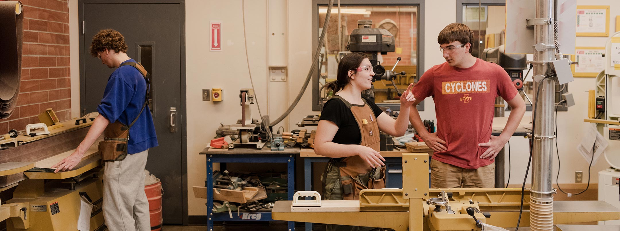 Two students working in metals shop.